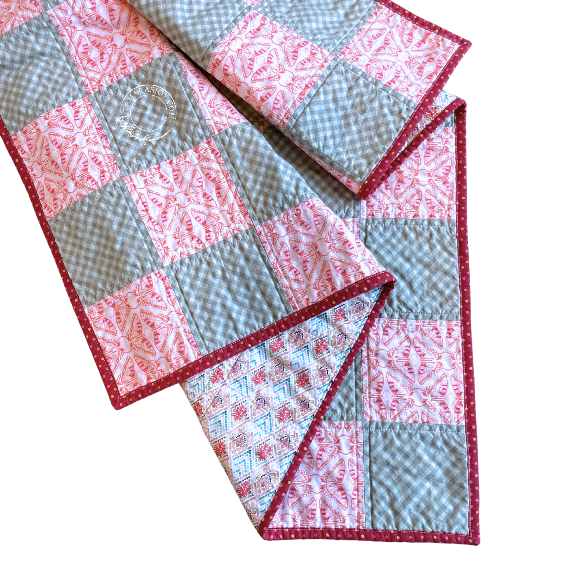 Baby Blanket showing it's folds so you can see the back and front.